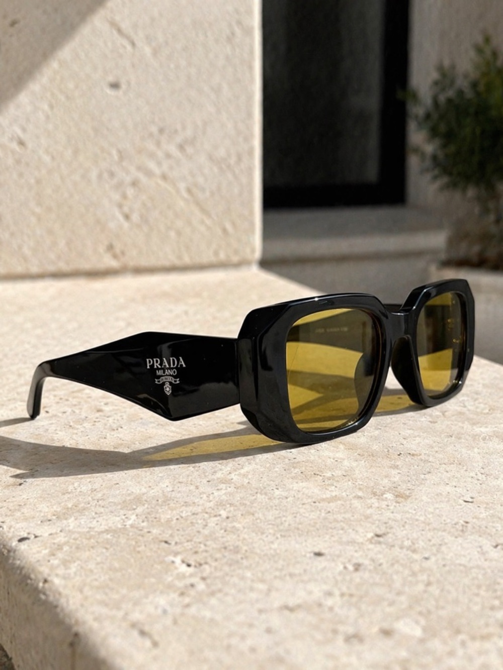 Prada Black Frame Sunglasses with Yellow Lenses - Picture 3 of 4